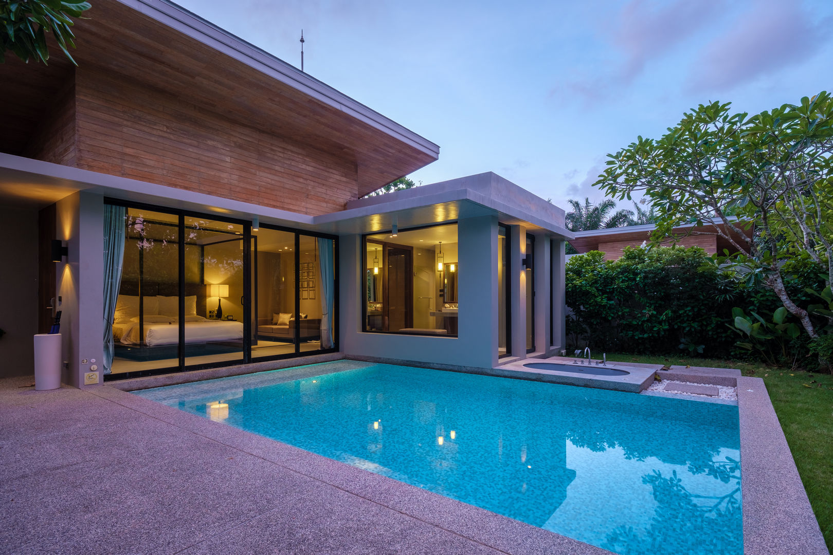 Modern house with a blue swimming pool and nice interior